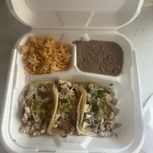 Three taco plate with Rice and Beans Drink is ordered separately.