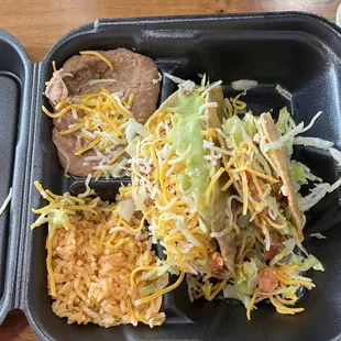 2 * Shredded Chicken Taco comes with side of rice and beans