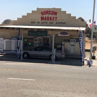 a car parked in front of the store