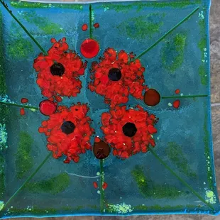 My 8" poppy designed slumped dish