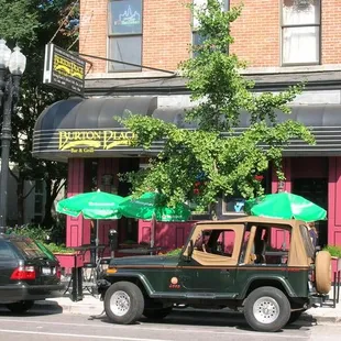 a jeep parked in front of a restaurant