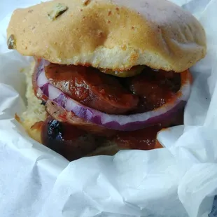 BBQ sausage sandwich on a jalapeno cheddar bun. Delicious