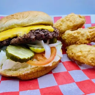 Delicious half-pound fresh beef patty with hand battered onion rings!! :o