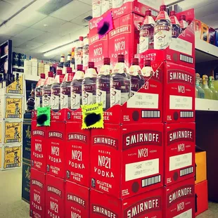 a large stack of bottles