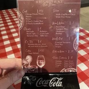 Drinks menu is too small with too small of print and hard to read. Need a bigger, better solution.