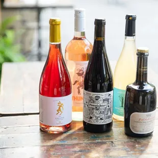 a selection of wine bottles on a table