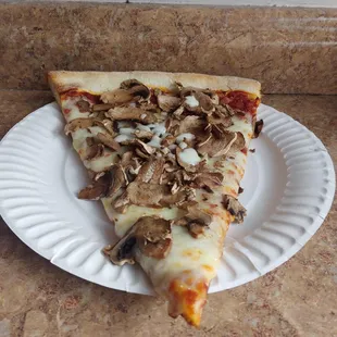 Cheese slice with added 1 topping mushrooms.