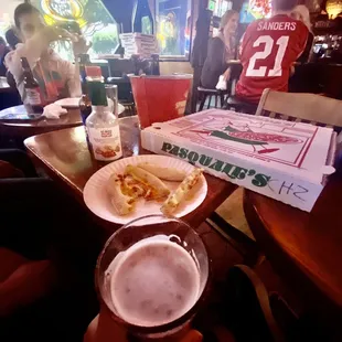 Complementary pesquales pizza on Sunday game day!