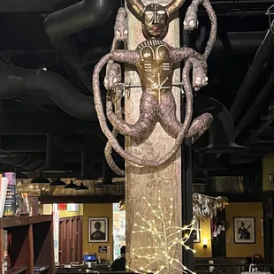 a statue of a horned head