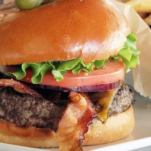 Grassfed Burger with Bacon and Cheddar Cheese on Brioche Bun