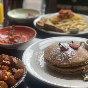pancakes, hash browns, eggs, and fruit