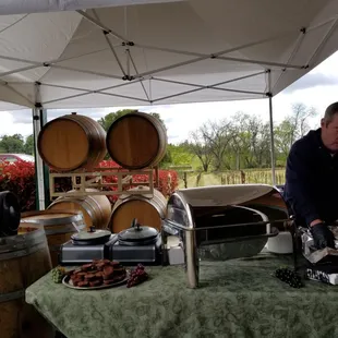 a man pouring wine