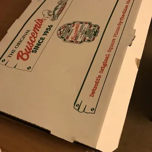 a pizza box on a table