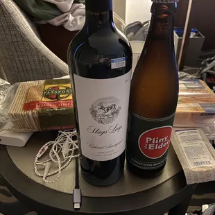 two bottles of wine on a table