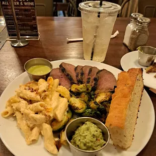 The Chimichurri Tri-tip plate with a side of Brussel Sprouts and Mac n cheese.