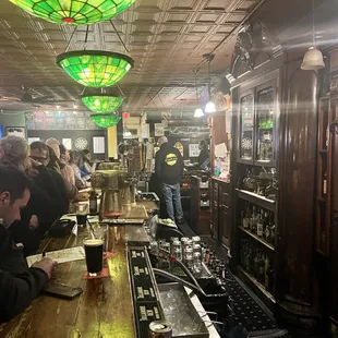 people sitting at a bar
