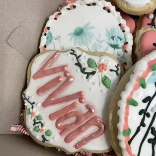 a box of decorated cookies
