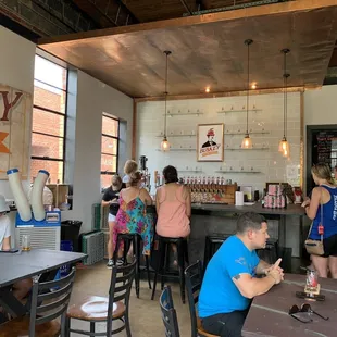 a group of people sitting at tables