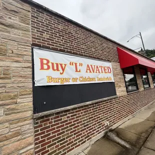 a sign on the side of a building