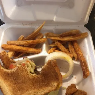 a sandwich and fries