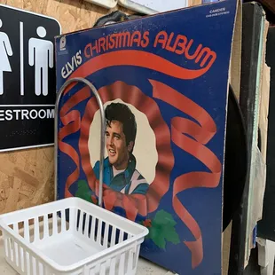 Elvis one table away from the garage stuff table.