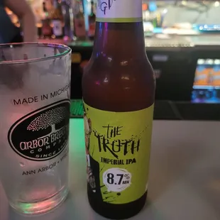 a bottle and a glass