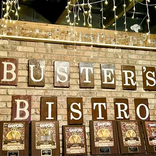 a brick wall with plaques on it