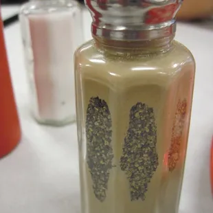 Condiments could have used a proper cleaning.