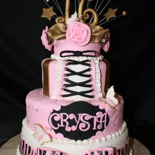 a pretty pink and gold cake