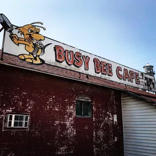 the sign for busy bee cafe