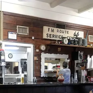 a man sitting at the counter