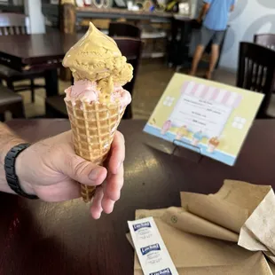 Butter toffee and strawberry in waffle cone