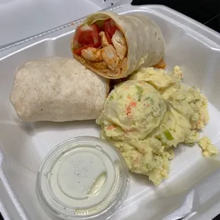 Buffalo Chicken Wrap with potato salad and a side of Ranch dressing.