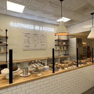 a man standing behind the counter