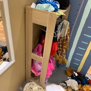 Heavy wooden toy that was not mounted to the wall.