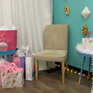 The tables + chairs provided.