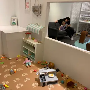 Heavy wooden toy that was not mounted to the wall.