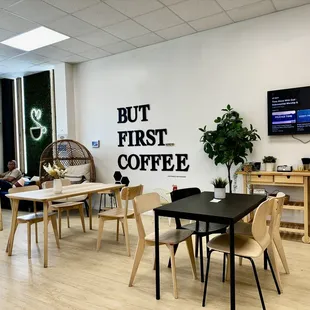Seating area for But First... Coffee Shop.