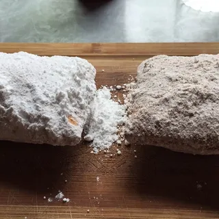 Single Powdered Sugar Beignet