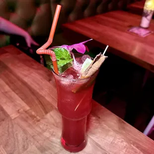 La Chupacabra - hibiscus rum, mezcal, falernum, cinnamon, pomegranate, grapefruit, lime, bitters