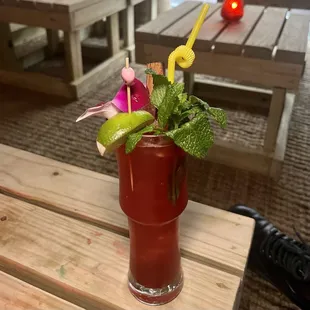 La Chupacabra - hibiscus rum, mezcal, falernum, cinnamon, pomegranate, grapefruit, lime, bitters