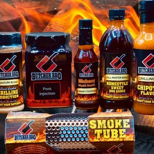 a variety of hot sauces on a grill