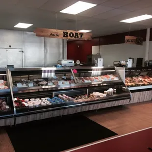 a display of meat and pastries