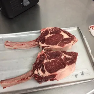 Two beautiful fresh tomahawk steaks