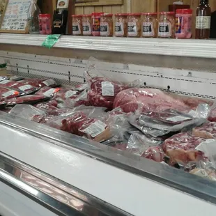 a meat section in a grocery store