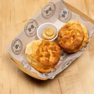 Couple of biscuits with honey butter