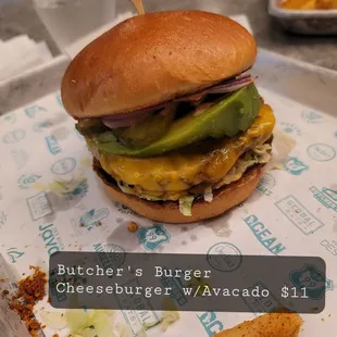 Butcher&apos;s Burger cheeseburger with Avacado $11.00