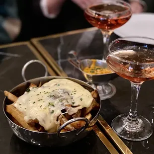 Mountain fries, Caramelized onion, Raclette cheese.