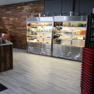 Our dairy case, stocked with fresh milk, homemade broths, and prepared foods like truffle mac'n cheese.