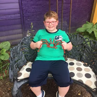 Lucas's art fair find - a metal crab made from work tools.